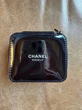 CHANEL Black Patent Makeup Pouch with White Logo